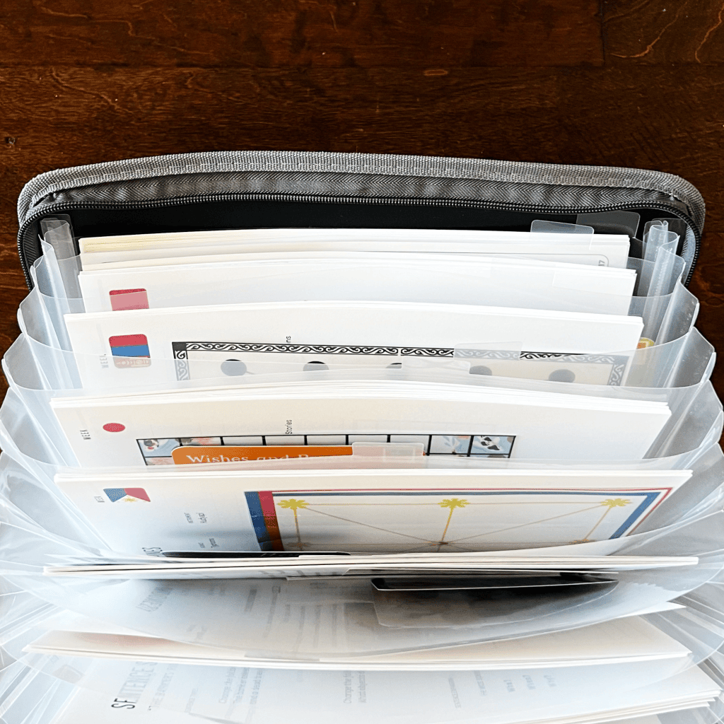 How to organize homeschool unit study materials using an accordion folder so printable resources are easily viewed at a glance